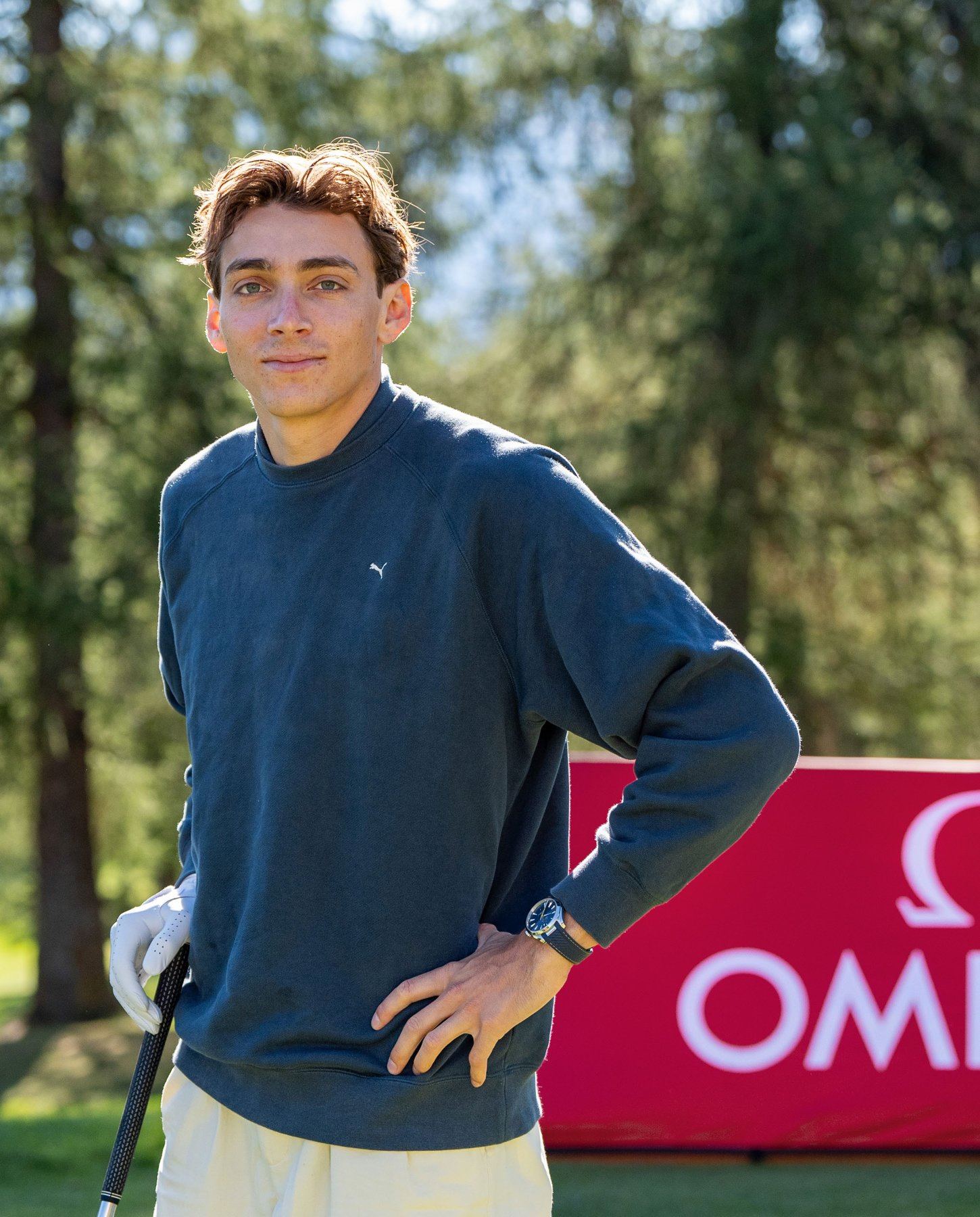 Mondo Duplantis wearing an Omega watch on the golf course