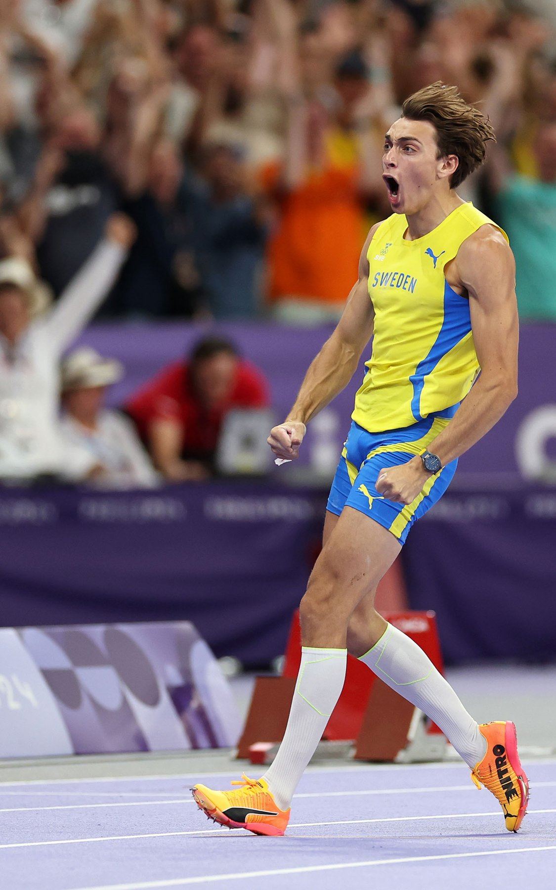 Mondo celebrating on the athletics track